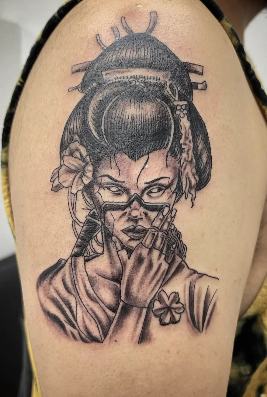 A woman with glasses and a long hair style